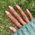 Sandy on customer hand