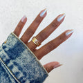 Frosted Gloss on customer hand
