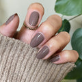 Fawn on customer hand