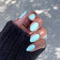 Minty on customer hand