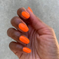 Orange Wedge on customer hand