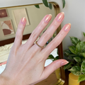 Gold Drops on customer hand